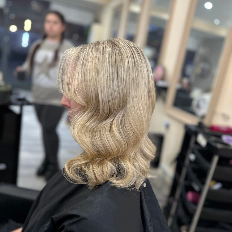 Champagne blonde hair created at BLOND Salon